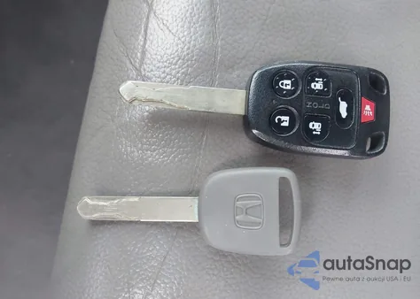 2012 Honda Odyssey Ex-L z USA, uszkodzony, nr VIN 5FNRL5H66CB093777